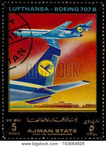 Moscow Russia - July 03 2017: A stamp printed in Ajman shows passenger airliner Boeing 707 Lufthansa series 