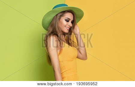 Beautiful Girl In Summer Hat Posing.