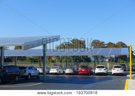 HOUSTON, USA - JANUARY 12, 2017: Some cars parked, with some solar panel protecting from the sun in Legoland park, Legoland is a theme park based on the popular LEGO brand of building toys.