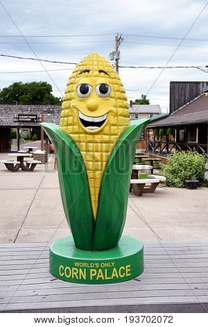 MITCHELL, SOUTH DAKOTA - JUNE 22, 2017: The Corn Palace Corn Statue. Built in 1892 as a way for farmers to display their bounty. It is annually covered with new murals.