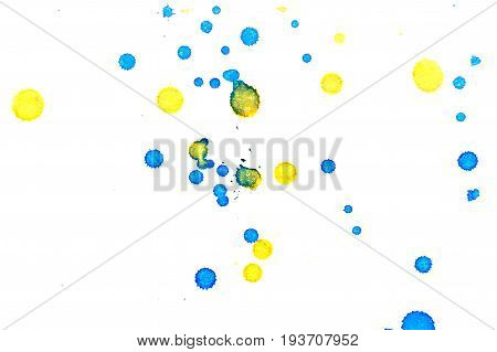 Abstract two-color yellow blue ink splash. Ink blots. Elements of design. The water-soluble ink on white paper Leste. Abstractionism