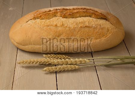 Homemade Baked Bread Flour And Wheat On Light Wooden Background