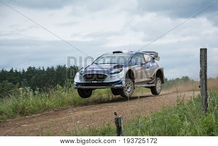 MIKOLAJKI, POLAND - JUL 1: Ott Tanak and his codriverMartin Jarveoja  in aFord Fiesta WRC race in the 74nd Rally Poland, on July 2, 2017 in Mikolajki, Poland.