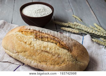 Homemade Baked Bread Flour And Wheat On Light Wooden Background