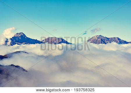 Clouds cover the mountain tops. Fisht Oshten Pshecho Su mountains. Caucasus. Russia.