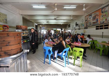 People Having Lunch At Street Eatery In Gaya Street Kota Kinabalu