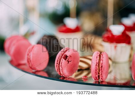 Dessert Sweet Tasty Macarons And Cookies In Candy Bar On Table. Delicious Sweet Buffet. Wedding Decorations
