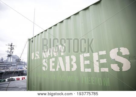 Ship Tour USS Kearsarge (LHD 3) Wasp-class amphibious assault ship: U.S. Navy Seabees on side of container on display, flight deck. Fleet Week NEW YORK MAY 25 2017.