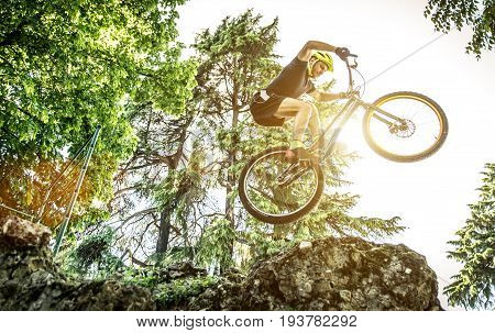 Young athlete making tricks on his bicycle