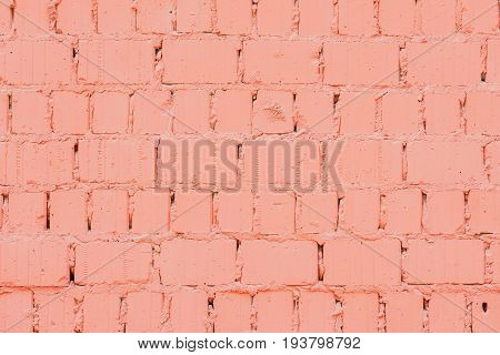 Vintage dyed brick wall with cracks, background and texture, natural design, patterns, extured background with space for copy text.