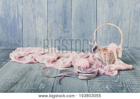 Yarn balls in basket. Knitwork background. Art craft, hand made. Handiwork, knitting needlework