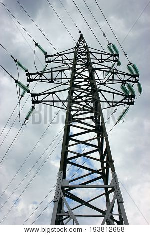 Transmission power tower electricity pylon . Steel lattice tower used to support an overhead power line