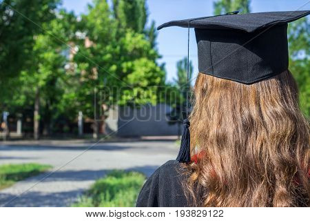 Back Of Graduate On Graduation Day