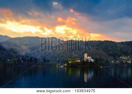 Magical sunset landscape with the island on Lake Bled (Blejsko jezero). Julian Alps Slovenia