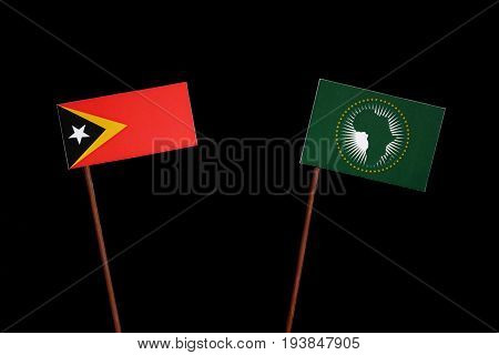 East Timorese Flag With African Union Flag Isolated On Black Background