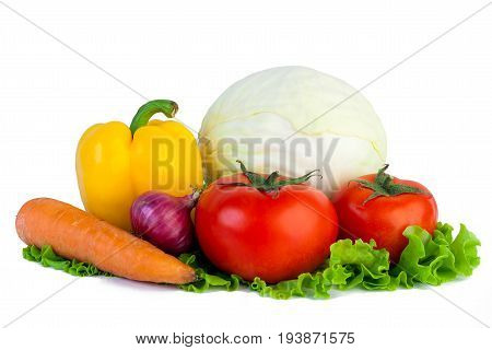 Vegetables on isolated white background. Cabbage tomato onion pepper carrot