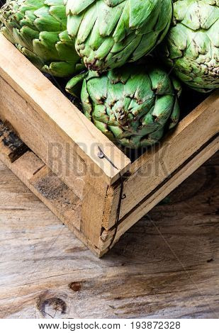 Artichoke. Box Of Fresh Artichoke. Harvest Concept. Copy Space