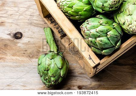 Artichoke. Box Of Fresh Artichoke. Harvest Concept. Copy Space