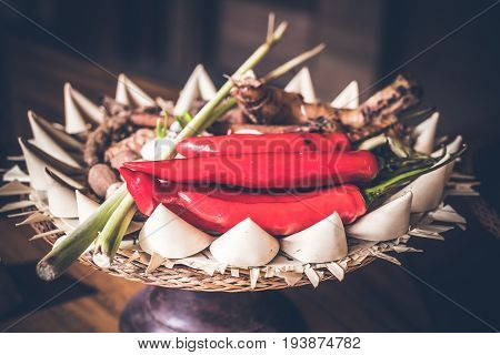 Red Chili peppers in a traditional balinese small basket.
