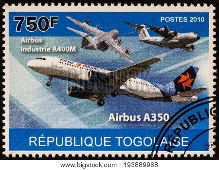 Moscow Russia - July 04 2017: A stamp printed in Togo shows plane Airbus A350 series "Transport - Airliners" circa 2010
