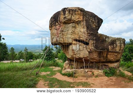 Mor Hin Khao or Thai Stonehenge in the Phu Laenkha National Park with Stormy Clouds considered as a beautiful viewpoint located in Chaiyaphum Thailand