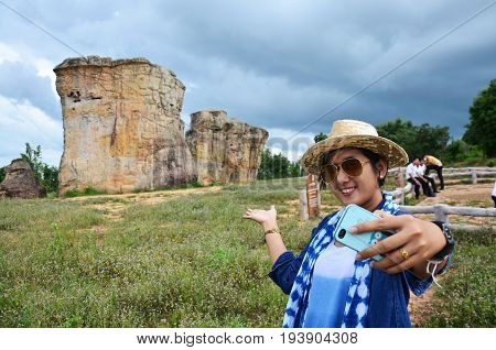 Thai Women People Travel And Posing Shooting Photo With Mor Hin Khao