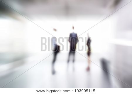 Blur abstract background of business people standing in building hall