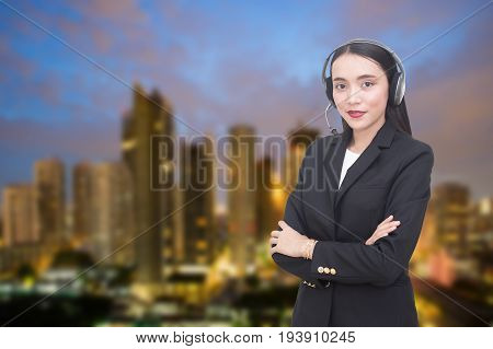 Support Phone Operator In Headset At City Background Woman With Call Center Concept 20-30 Years Old.