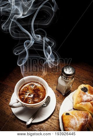 a cup of coffee and cakes - still life