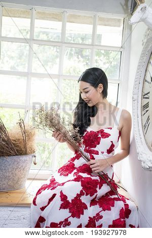 Beautiful Asian Woman Sitting And Waiting In Vintege Room 20s-30s Age
