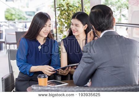 Beautiful Asian Woman Working With Team For Outdoor Business Discussion Business Discussion Concept.