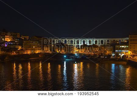 Old city and sea night view in Kavala, Greece