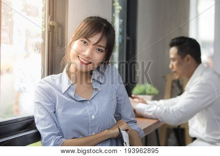 Asian Young Woman With Happy Emotion At Working Place 20-30 Year Old.