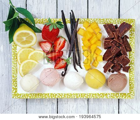 Various ice creams and their ingedients on plate
