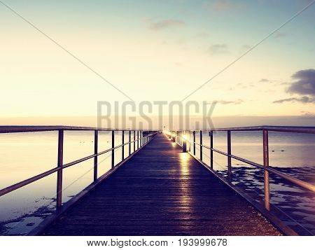 Foot Bridge. Sea Bridge. Slippery Wooden Constrution  Above Sea.