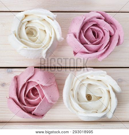 Beautiful Delicious Dessert. Zephyr In The Shape Of Flowers Roses. Berry And Apple Zephyr On Light W