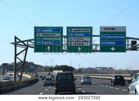 Road Junction In The Italian Highway Called Gra And Indications To Rome And Other Italian Place