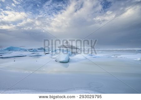 Icy Lagoon Of Fjallsárlón With A Cold Blue Color