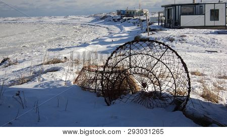 Lobster Cages On The Snow Along The St. Lawrence River