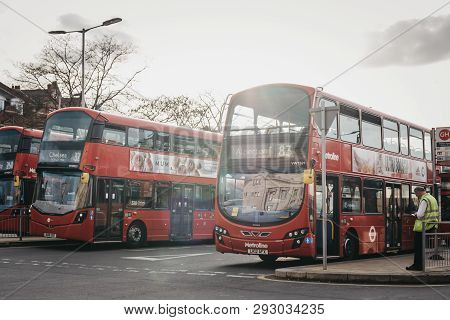 London, Uk - March 23, 2019: Red Double Decker Buses At Golders Green Bus Station. Buses Are An Inte