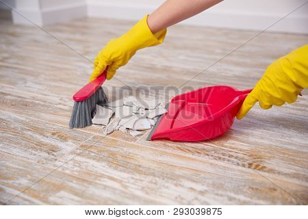 Clean Up Broken Plate With Broom And Dustpan