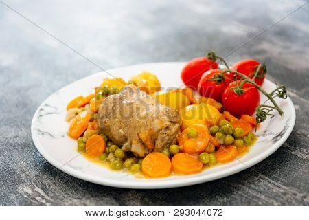 Beef meat stewed with potatoes-Traditional French cuisine Beef Bourguignon potatoes carrots in persillade
