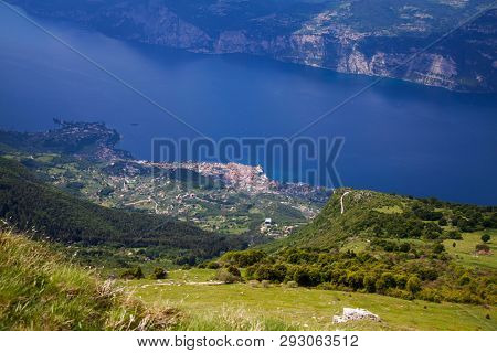 View of the Lake Garda from Monte Baldo, Italy.Panorama of the gorgeous Garda lake surrounded by mountains.