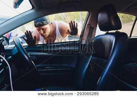 A Man That Is Locked Out Of His Car.