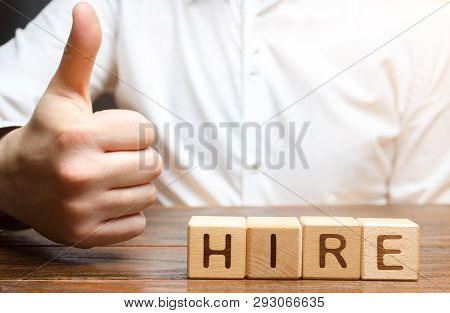 Businessman Shows Thumb Up And Hiring Inscription. Consent To Hire An Employee, Good Recommendations