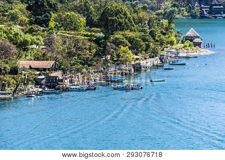 Santa Cruz La Laguna, Lake Atitlan, Guatemala - February 26, 2019: High Viewpoint View Of Dock & Boa