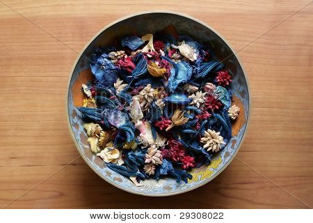 Bowl of dry decorative herbs and flowers from above