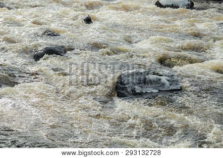 Rough River Jokelanjoki And Stones In Water, Kouvola, Finland.