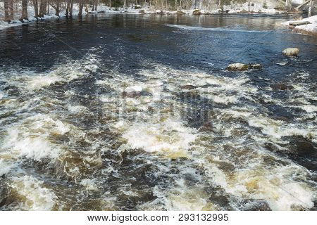 Rough River Jokelanjoki And Stones In Water, Kouvola, Finland.