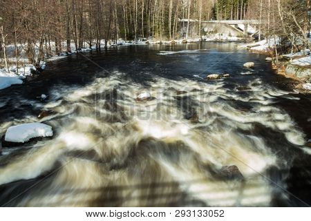 Long Exposure Photo. Rough River Jokelanjoki And Stones In Water, Kouvola, Finland.
